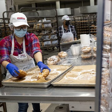 Costco Baking staff preparing baked goods in a commercial kitchen costco baking staff preparing baked goods in a commercial kitchen
