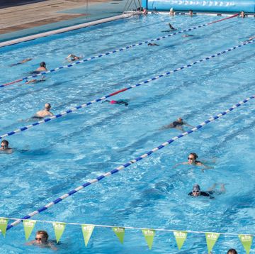 london, united kingdom 20210329 swimmers seen enjoying charlton lidos pool waters in greenwich people flock outdoor activities as lockdown restrictions are relaxed in england photo by phil lewissopa imageslightrocket via getty images