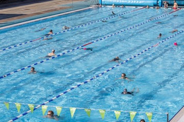 london, united kingdom 20210329 swimmers seen enjoying charlton lidos pool waters in greenwich people flock outdoor activities as lockdown restrictions are relaxed in england photo by phil lewissopa imageslightrocket via getty images