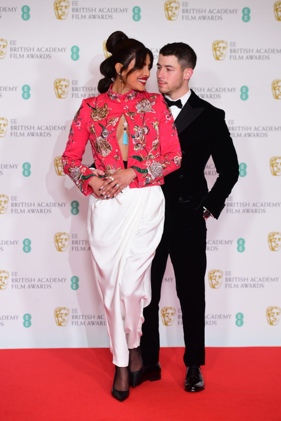 priyanka and nick show affection on the red carpet