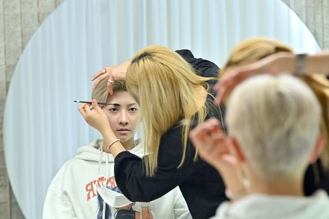 this picture taken on april 29, 2021 shows k pop boy band blitzers member lee jun young having his make up done at a beauty salon in seoul ahead of a promotional shoot   thirty teenagers, thousands of hours of training, dozens of shattered dreams it all comes to a head next week when the blitzers will be launched into the cut throat k pop market, hoping to become the next bts   to go with skorea music social entertainment kpop,focus by kang jin kyu photo by jung yeon je  afp  to go with skorea music social entertainment kpop,focus by kang jin kyu photo by jung yeon jeafp via getty images