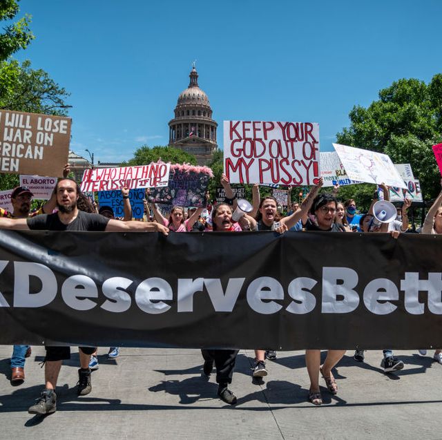 austin, tx   may 29 pro choice protesters march down congress avenue at a protest outside the texas state capitol on may 29, 2021 in austin, texas thousands of protesters came out in response to a new bill outlawing abortions after a fetal heartbeat is detected signed on wednesday by texas governor greg abbot photo by sergio floresgetty images