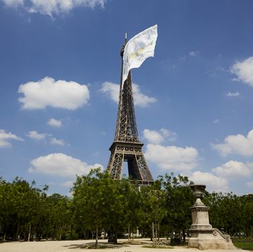 a mysterious giant flag floating on the eiffel tower in paris, france on june 8, 2021 after some research it seems that it was hoist for some tests for the summer olympic games of 2024 which will take place in paris photo by adnan farzatnurphoto via getty images