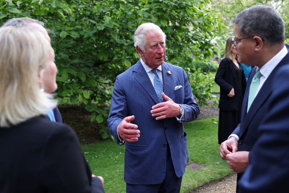 britains prince charles, prince of wales c talks with britains president for cop26 alok sharma r during an event at st james palace in london on june 10, 2021, where the prince unveiled the terra carta   prince charles on thursday announced the terra carta transition coalitions   an organised, global collective working together to drive investment towards a sustainable future for nature, people and planet the meeting and coalitions announcement form part of the wider g7 activity taking place in cornwall photo by chris jackson  pool  afp photo by chris jacksonpoolafp via getty images