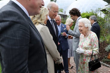 topshot   britains queen elizabeth ii r speaks with us president joe biden and us first lady jill biden and leaders of the g7 during a reception at the eden project in south west england on june 11, 2021   g7 leaders from canada, france, germany, italy, japan, the uk and the united states meet this weekend for the first time in nearly two years, for three day talks in carbis bay, cornwall photo by jack hill  pool  afp photo by jack hillpoolafp via getty images