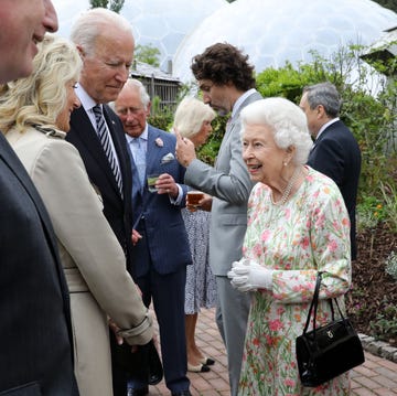 TOPSHOT-BRITAIN-G7-SUMMIT-ROYALS topshot britains queen elizabeth ii r speaks with us president joe biden and us first lady jill biden and leaders of the g7 during a reception at the eden project in south west england on june 11, 2021 g7 leaders from canada, france, germany, italy, japan, the uk and the united states meet this weekend for the first time in nearly two years, for three day talks in carbis bay, cornwall photo by jack hill pool afp photo by jack hillpoolafp via getty images