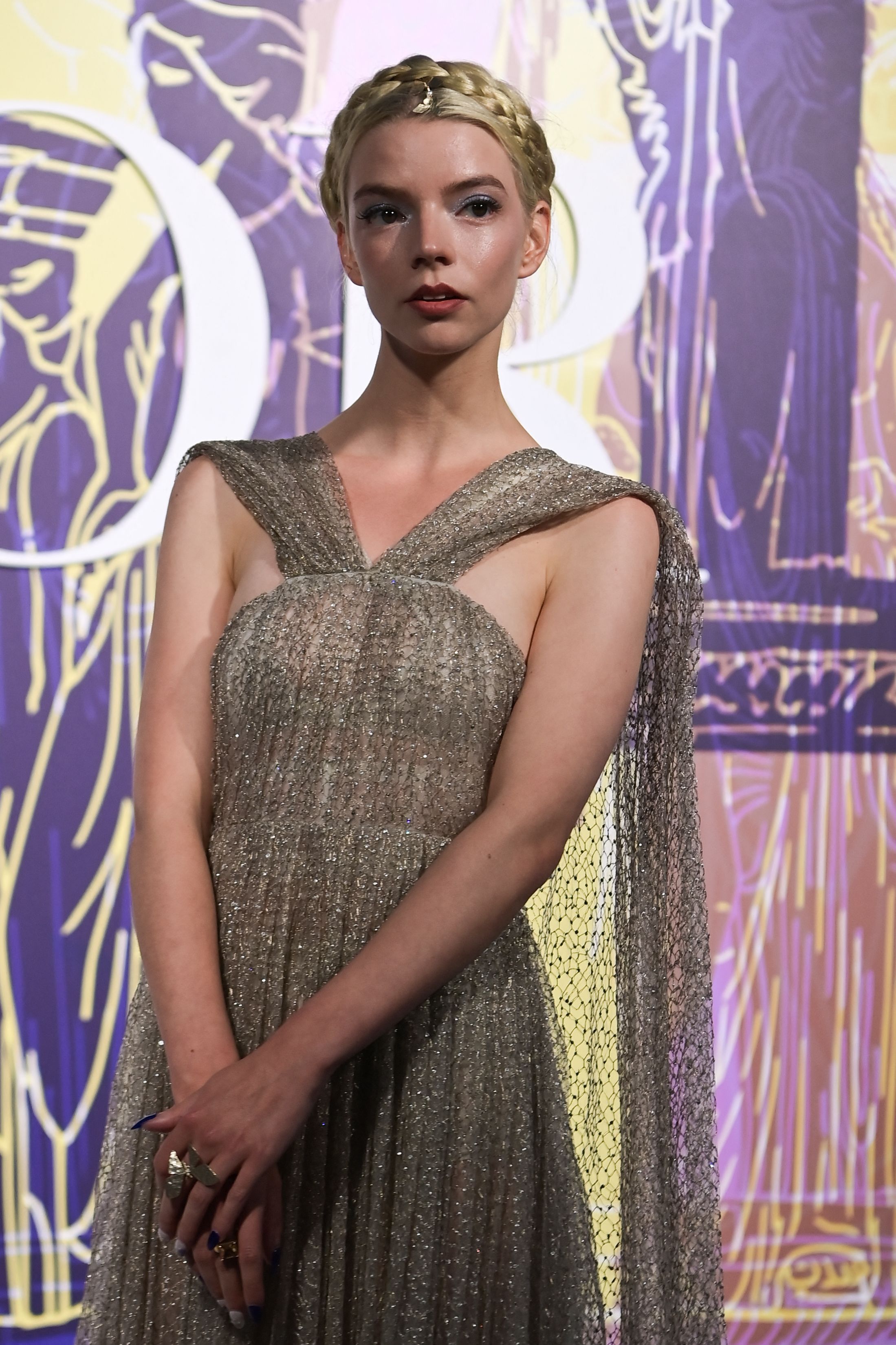 Anya TaylorJoy Looks Ethereal in White FloorLength Dior Dress  Hidden  Heels for The Northman LA Premiere