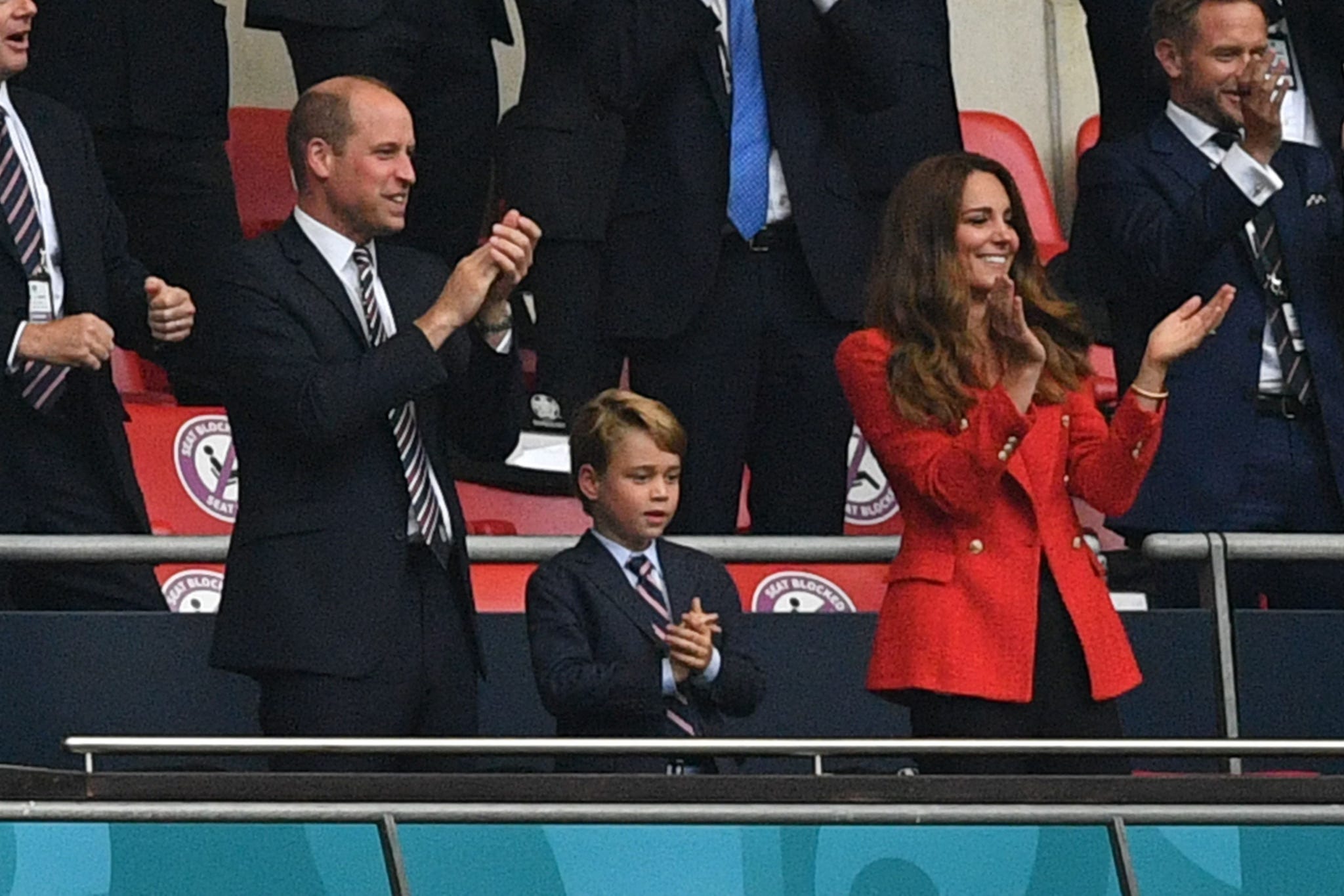 David Beckham looks dapper in beige suit as he watches World Cup