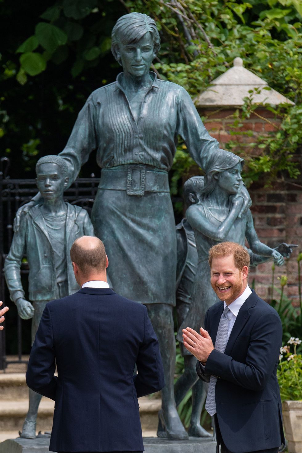 london, england   july 01 prince william, duke of cambridge left and prince harry, duke of sussex unveil a statue they commissioned of their mother diana, princess of wales, in the sunken garden at kensington palace, on what would have been her 60th birthday on july 1, 2021 in london, england today would have been the 60th birthday of princess diana, who died in 1997 at a ceremony here today, her sons prince william and prince harry, the duke of cambridge and the duke of sussex respectively, will unveil a statue in her memory photo by dominic lipinski   wpa poolgetty images