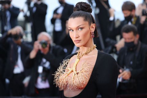 topshot   us model bella hadid poses as she arrives for the screening of the film tre piani three floors at the 74th edition of the cannes film festival in cannes, southern france, on july 11, 2021 photo by valery hache  afp photo by valery hacheafp via getty images