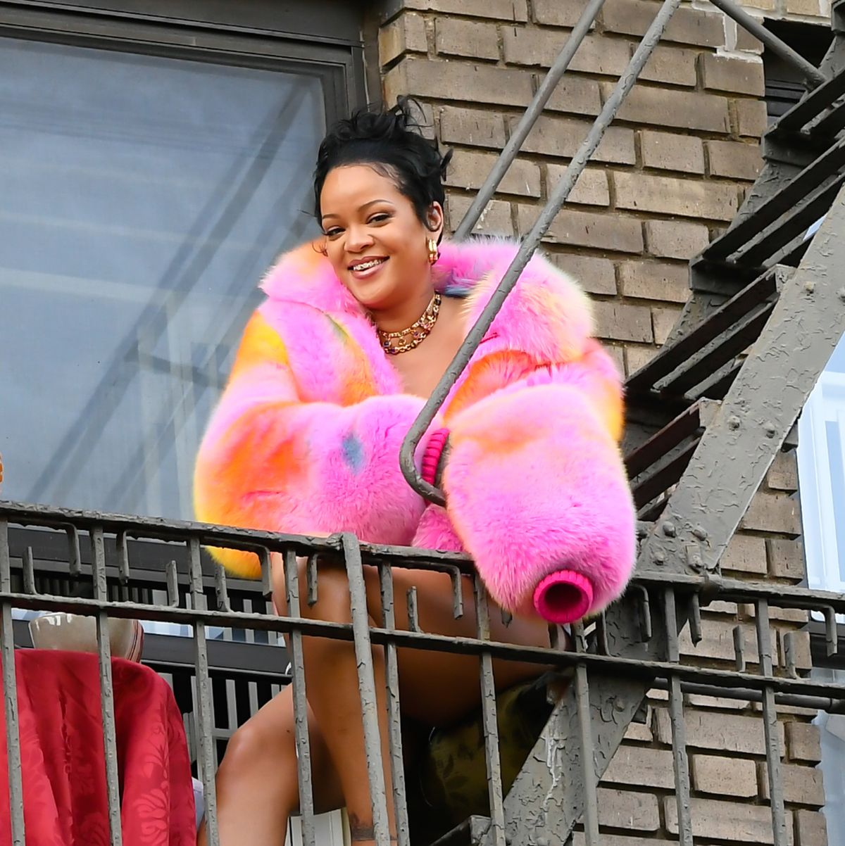 Rihanna Pairs a Pink Fur Bucket Hat with Camouflage Pants in NYC