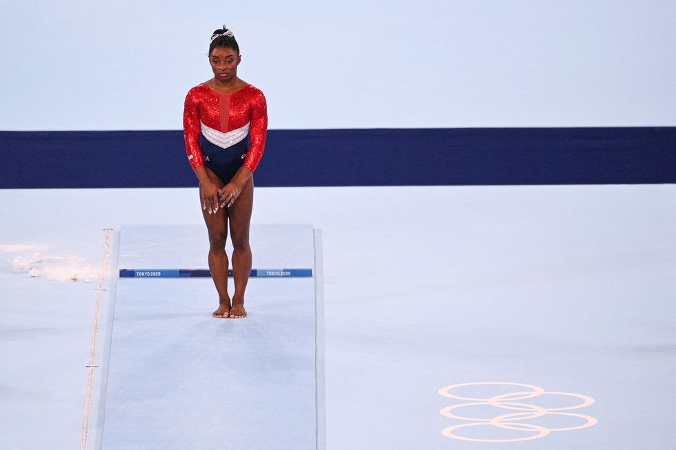 us's simone biles waits before competing in the vault event of the artistic gymnastics women's team final during the tokyo 2020 olympic games at the ariake gymnastics centre in tokyo on july 27, 2021 photo by martin bureau  afp photo by martin bureauafp via getty images