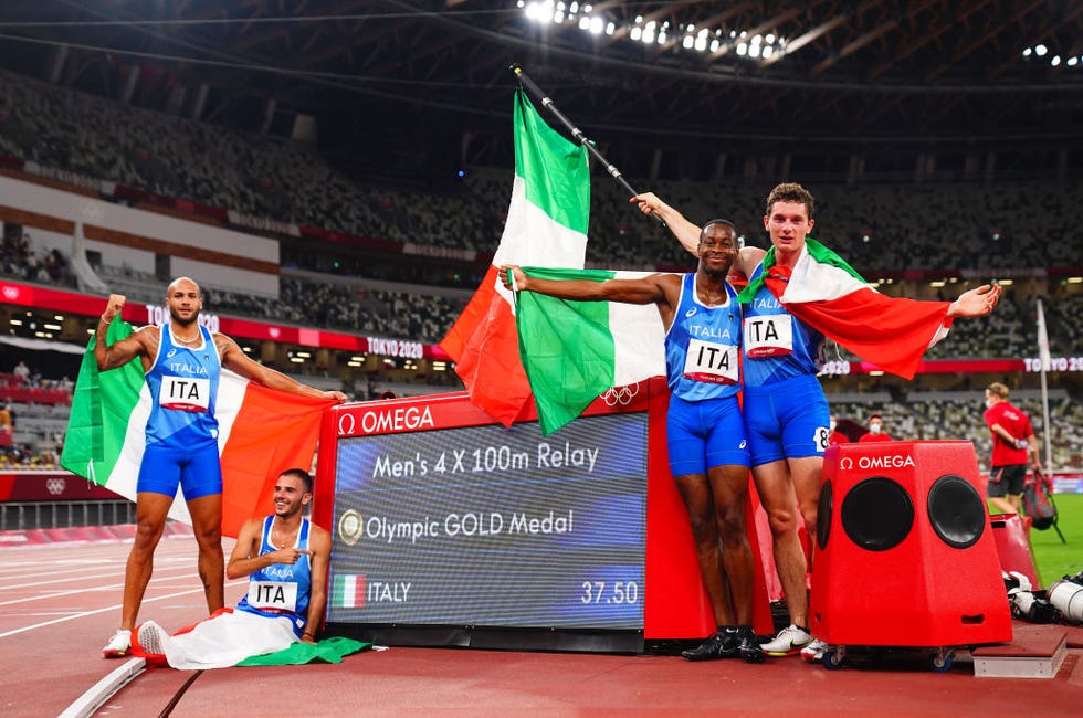 tokyo, japan august 06 lorenzo patta of italy, lamont marcell jacobs of italy, eseosa desalu of italy and filippo tortu of italy celebrates after winning gold in the mens 4 x 100m relay final during olympic games day 14 at olympic stadium on august 6, 2021 in tokyo, japan photo by aleksandra szmigiel poolgetty images