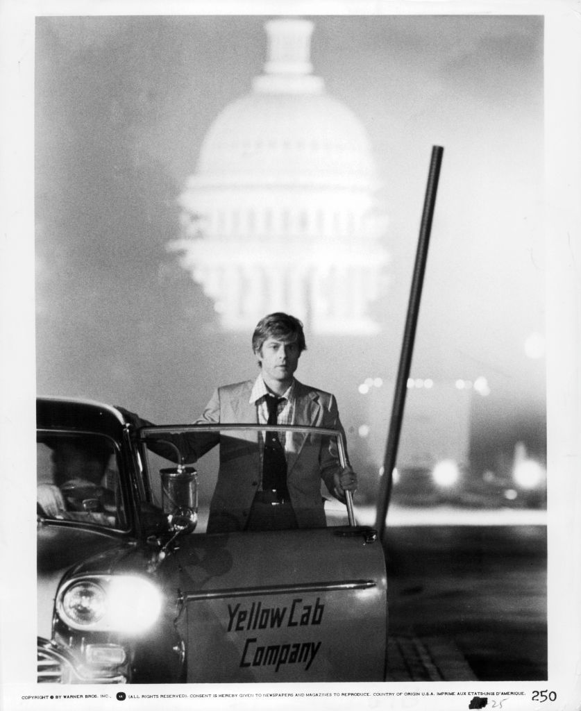 robert redford stands behind cab door in a scene from the film all the presidents men, 1976 photo by warner brothersgetty images