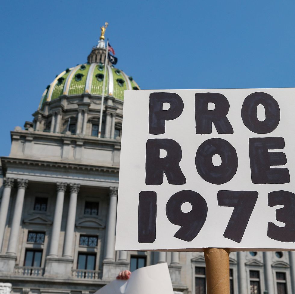 harrisburg, united states 20210912 a protester holds a placard in front of the pennsylvania state capitol during the rally for reproductive rightsthe rally was organized after the united states supreme court refused to block a texas law prohibiting almost all abortions photo by paul weaversopa imageslightrocket via getty images