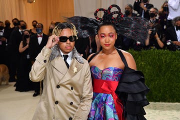 japanese tennis player naomi osaka r and us singer cordae arrive for the 2021 met gala at the metropolitan museum of art on september 13, 2021 in new york this years met gala has a distinctively youthful imprint, hosted by singer billie eilish, actor timothee chalamet, poet amanda gorman and tennis star naomi osaka, none of them older than 25 the 2021 theme is in america a lexicon of fashion photo by angela weiss afp photo by angela weissafp via getty images