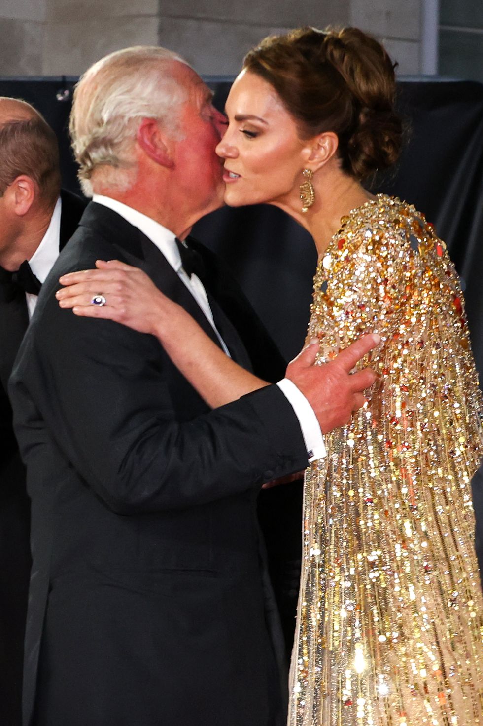 britains prince charles, prince of wales l kisses britains catherine, duchess of cambridge as they arrive for the world premiere of the james bond 007 film no time to die at the royal albert hall in west london on september 28, 2021 celebrities and royals walk the red carpet in central london on tuesday for the star studded but much delayed world premiere of the latest james bond film, no time to die photo by chris jackson pool afp photo by chris jacksonpoolafp via getty images