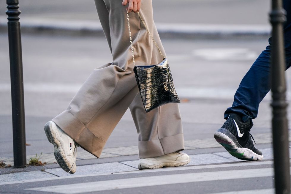 Street fashion, Footwear, Fashion, Human leg, Leg, Shoe, Snapshot, Ankle, Jeans, Pedestrian, 
