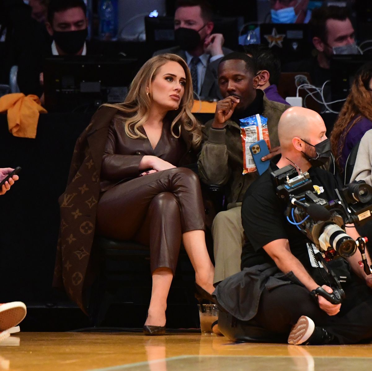 Adele Wore an All-Leather Jumpsuit and Louis Vuitton Coat Courtside