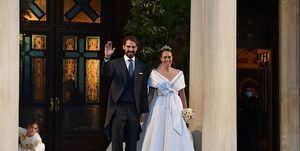 prince philippos l and nina flohr r depart from the metropolitan cathedral of athens following their wedding, in athens, greece, on october 23, 2021  photo by nicolas koutsokostasnurphoto via getty images