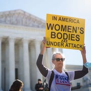 US-JUSTICE-RIGHTS-ABORTION pro choice demonstrators are seen outside of the us supreme court in washington, dc on november 1, 2021 the supreme court is set to hear challenges to texas restrictive abortion laws the conservative majority us supreme court hears challenges on monday to the most restrictive law passed since abortion was made a constitutional right nearly 50 years ago a texas bill that bans a woman from terminating a pregnancy after six weeks photo by mandel ngan afp photo by mandel nganafp via getty images