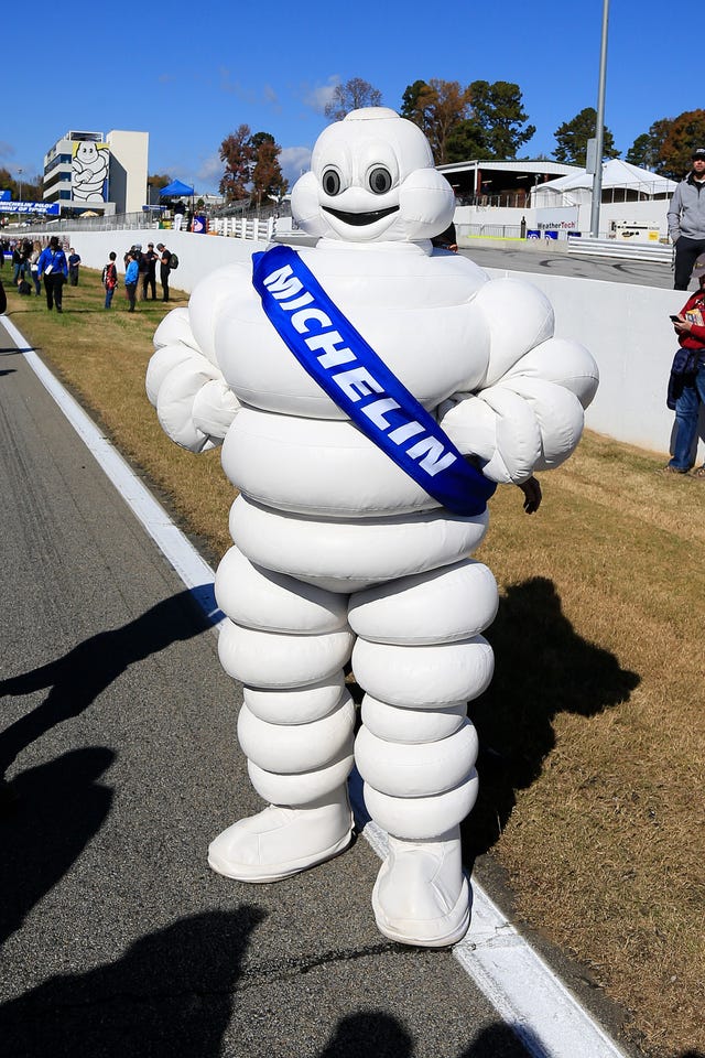 the michelin mascot at a car race