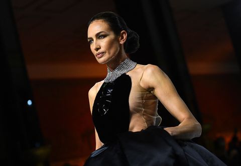 Spanish model and TV presenter Nieves Alvarez presents a creation by Stephane Rolland during the Spring/Summer 2022 Haute Couture collection runway show in Paris on March 25, 2022
