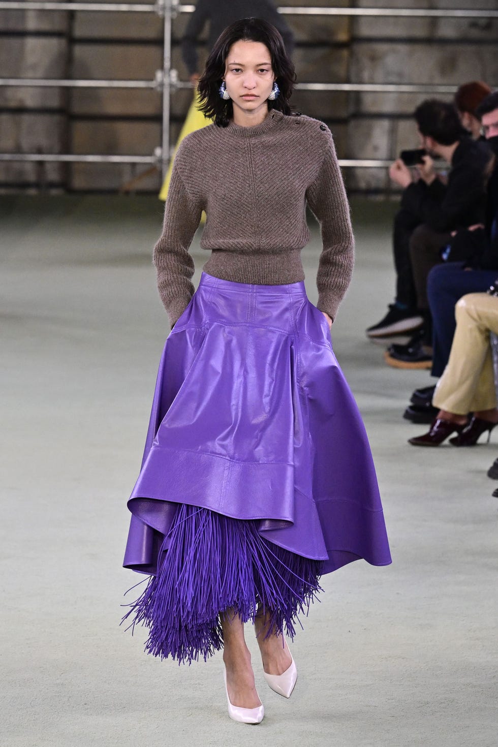 model presents a creation during the bottega veneta catwalk show for the fallwinter 20222023 on the fifth day of the milan fashion week in milan on february 26, 2022 photo by miguel medina  afp photo by miguel medinaafp via getty images