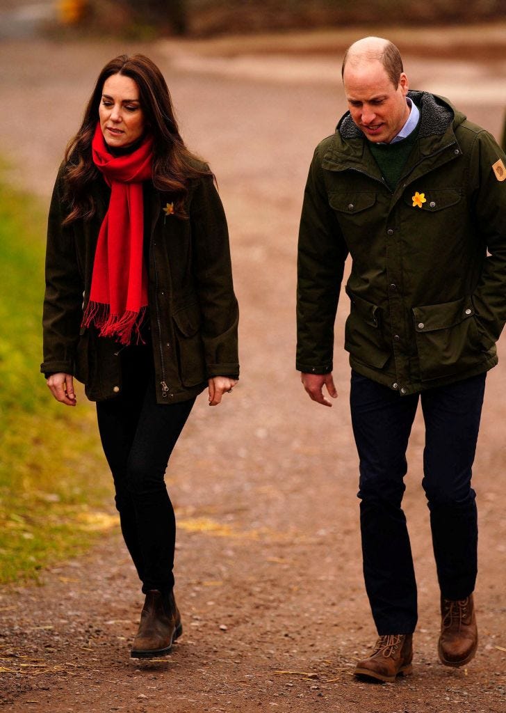 britains prince william, duke of cambridge, and britains catherine, duchess of cambridge, react during their visit to pant farm, a goat farm that has been providing milk to a local cheese producer for nearly 20 years, near abergavenny, south wales, on march 1, 2022 photo by ben birchall  pool  afp photo by ben birchallpoolafp via getty images