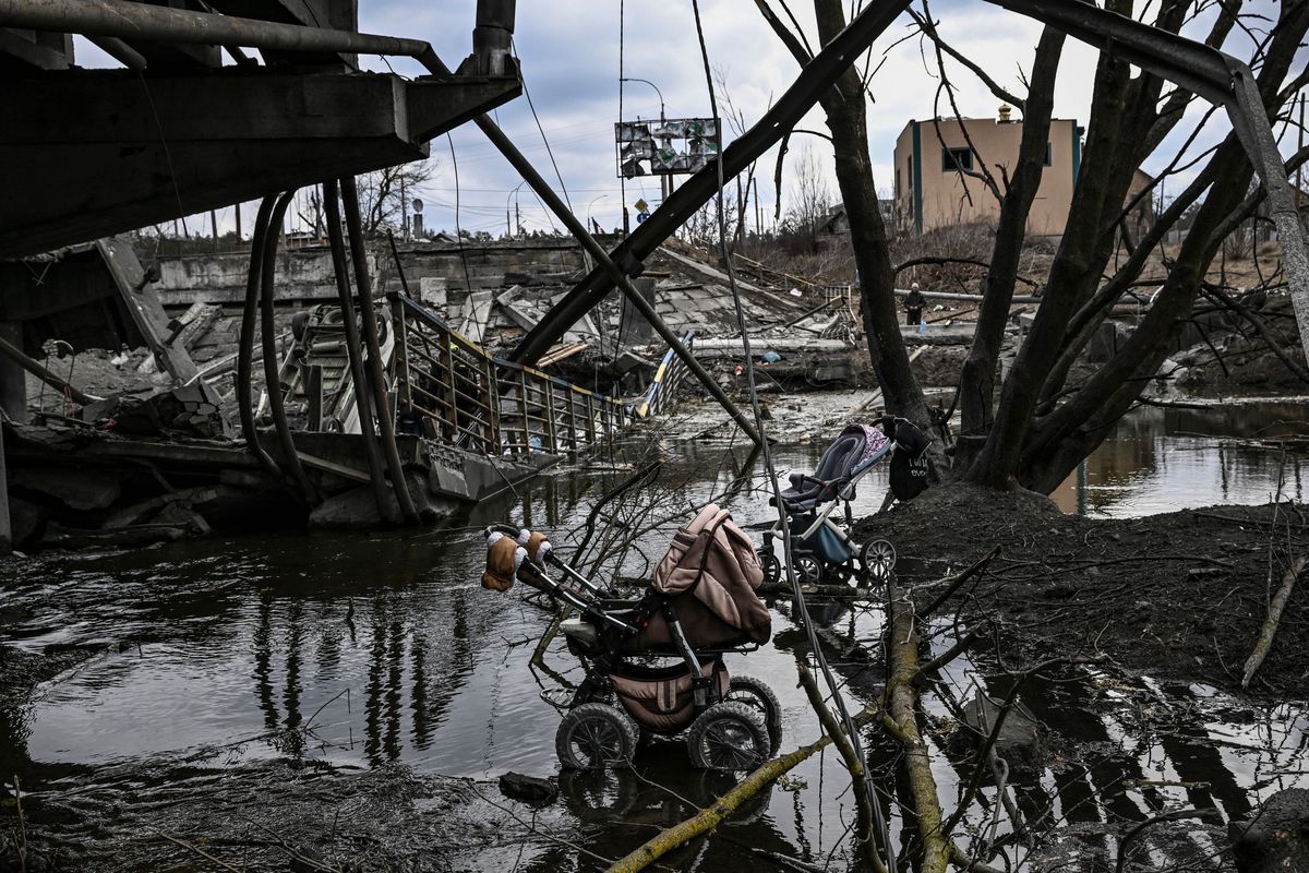 topshot   abandoned strollers are pictured under a destroyed bridge as people flee the city of irpin, west of kyiv, on march 7, 2022   russian forces pummelled ukrainian cities from the air, land and sea on monday, with warnings they were preparing for an assault on the capital kyiv, as terrified civilians failed for a second day to escape besieged mariupol photo by aris messinis  afp photo by aris messinisafp via getty images