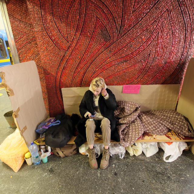 kyiv, ukraine   march 13, 2022   a woman equipped her sleeping place on one of the metropolitan subway stations, which now operate as a bomb shelters, kyiv, capital of ukraine photo credit should read pavlo bahmut ukrinformfuture publishing via getty images