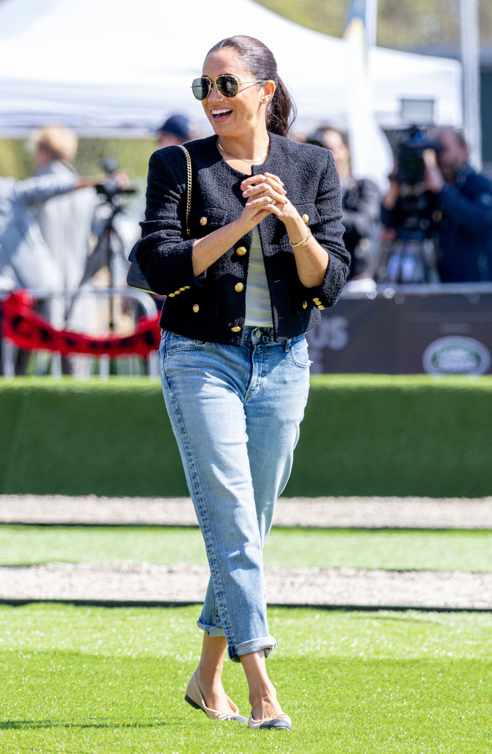 Meghan Markle Pairs a Tweed Jacket with Light-Wash Jeans for Invictus Games  Day 2