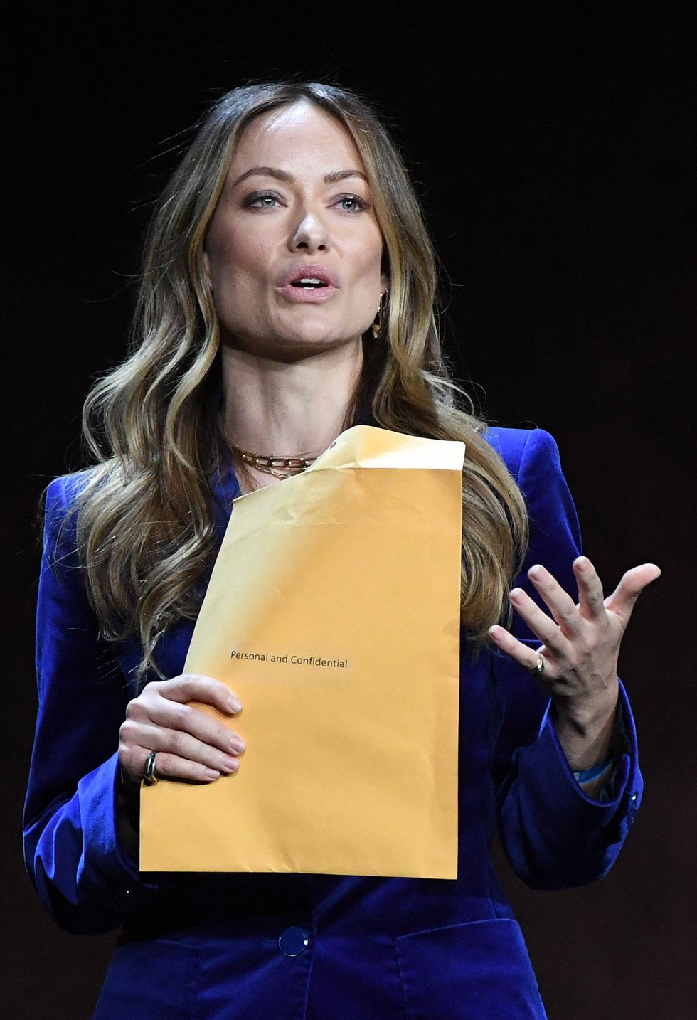 us director and actress olivia wilde holds an envelope reading personal and confidential as she speaks onstage during the warner bros pictures the big picture presentation during cinemacon 2022 at caesars palace in las vegas, nevada on april 26, 2022   when olivia wilde was handed a mysterious envelope on stage midway through her presentation before a packed las vegas audience, many assumed it was the set up for an elaborate joke
instead, she was getting served legal papers from her ex partner jason sudeikis
this is for me, right asked wilde, interrupted while introducing footage from her upcoming thriller dont worry darling during warner bros presentation at cinemacon, the annual movie theater industry gathering photo by valerie macon  afp photo by valerie maconafp via getty images
