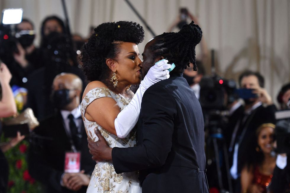 the couple embraces as they get engaged at the met gala