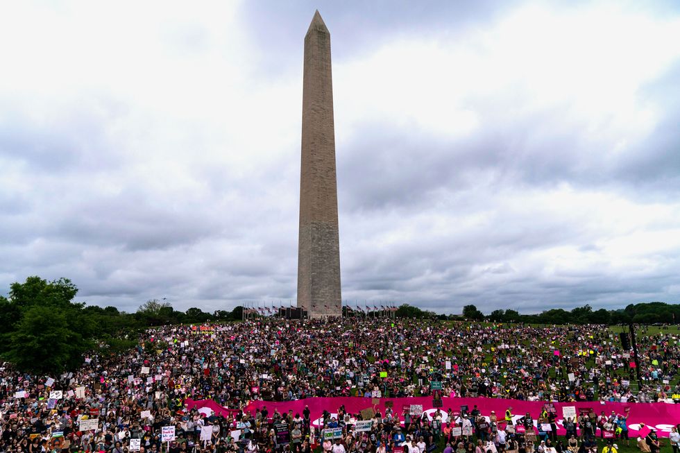 protestors participate in a bans off our bodies rally near the washington monument