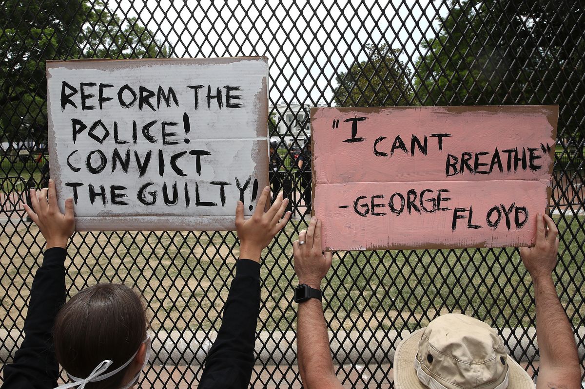 washington, dc   june 02 demonstrators hold up signs against a newly constructed fence at lafayette park near the white house while protesting against police brutality and the death of george floyd, on june 2, 2020 in minneapolis , minnesota protests continue to be held in cities throughout the country over the death of floyd, a black man who died in police custody in minneapolis on may 25  photo by win mcnameegetty images