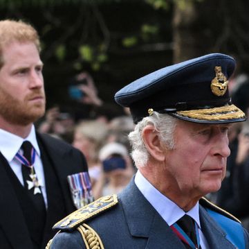 topshot britains king charles iii and britains prince harry, duke of sussex walk behind the coffin of queen elizabeth ii, adorned with a royal standard and the imperial state crown and pulled by a gun carriage of the kings troop royal horse artillery, during a procession from buckingham palace to the palace of westminster, in london on september 14, 2022 queen elizabeth ii will lie in state in westminster hall inside the palace of westminster, from wednesday until a few hours before her funeral on monday, with huge queues expected to file past her coffin to pay their respects photo by loic venance afp photo by loic venanceafp via getty images