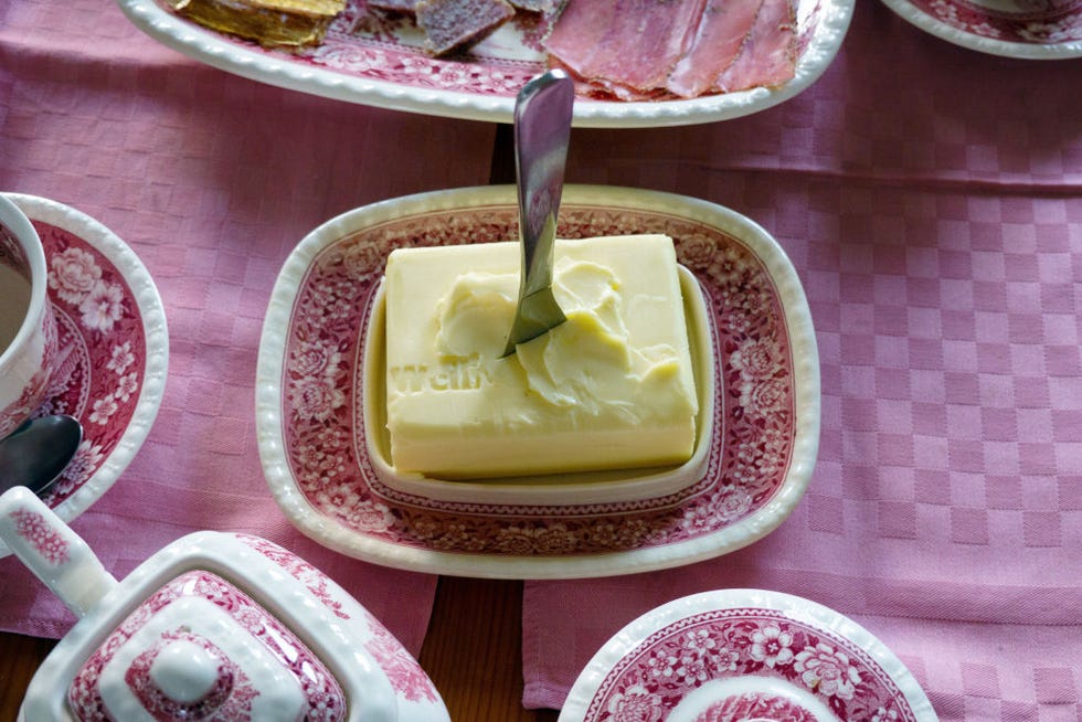 24 december 2022, thuringia, weimar a started piece of butter in a porcelain butter dish photo soeren stachedpa photo by soeren stachepicture alliance via getty images