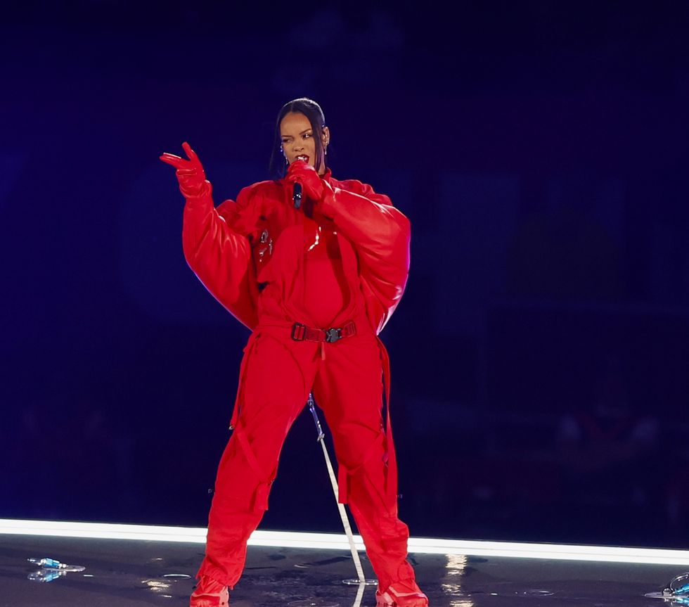 woman in red boiler suit