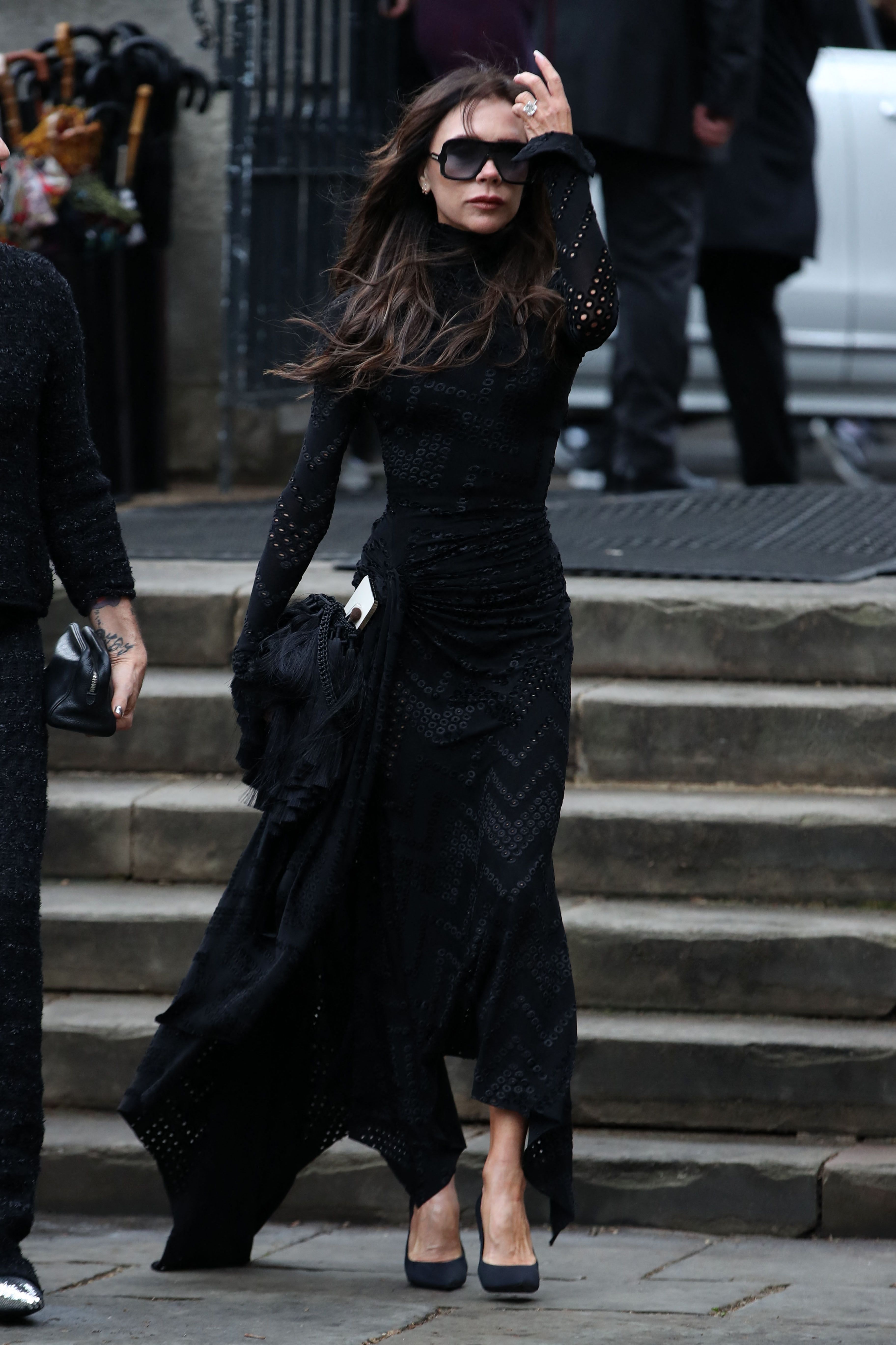 Victoria Beckham Wears a Black Lace Dress on a Yacht in