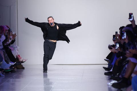 Chet Lo designer chet lo runs down a london fashion week catwalk showing off his blue tongue