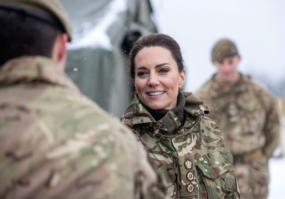 britains catherine, princess of wales c reacts as she meets members of the 1st battalion irish guards during her visit to the salisbury plain training area, near salisbury, southern england, on march 8, 2023 photo by steve reigate pool afp photo by steve reigatepoolafp via getty images