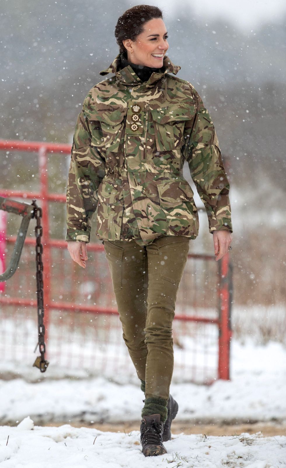 britains catherine, princess of wales reacts as she walks in the snow while meeting members of the 1st battalion irish guards during her visit to the salisbury plain training area, near salisbury, southern england, on march 8, 2023 photo by steve reigate pool afp photo by steve reigatepoolafp via getty images