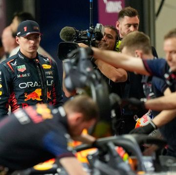 red bull racings dutch driver max verstappen l stands in their garages after being knocked out during the qualifying session of the saudi arabia formula one grand prix at the jeddah corniche circuit in jeddah on march 18, 2023 photo by luca bruno pool afp photo by luca brunopoolafp via getty images