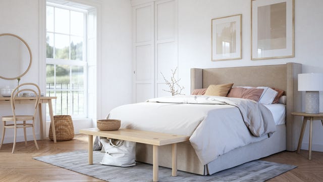 cama de color blanco