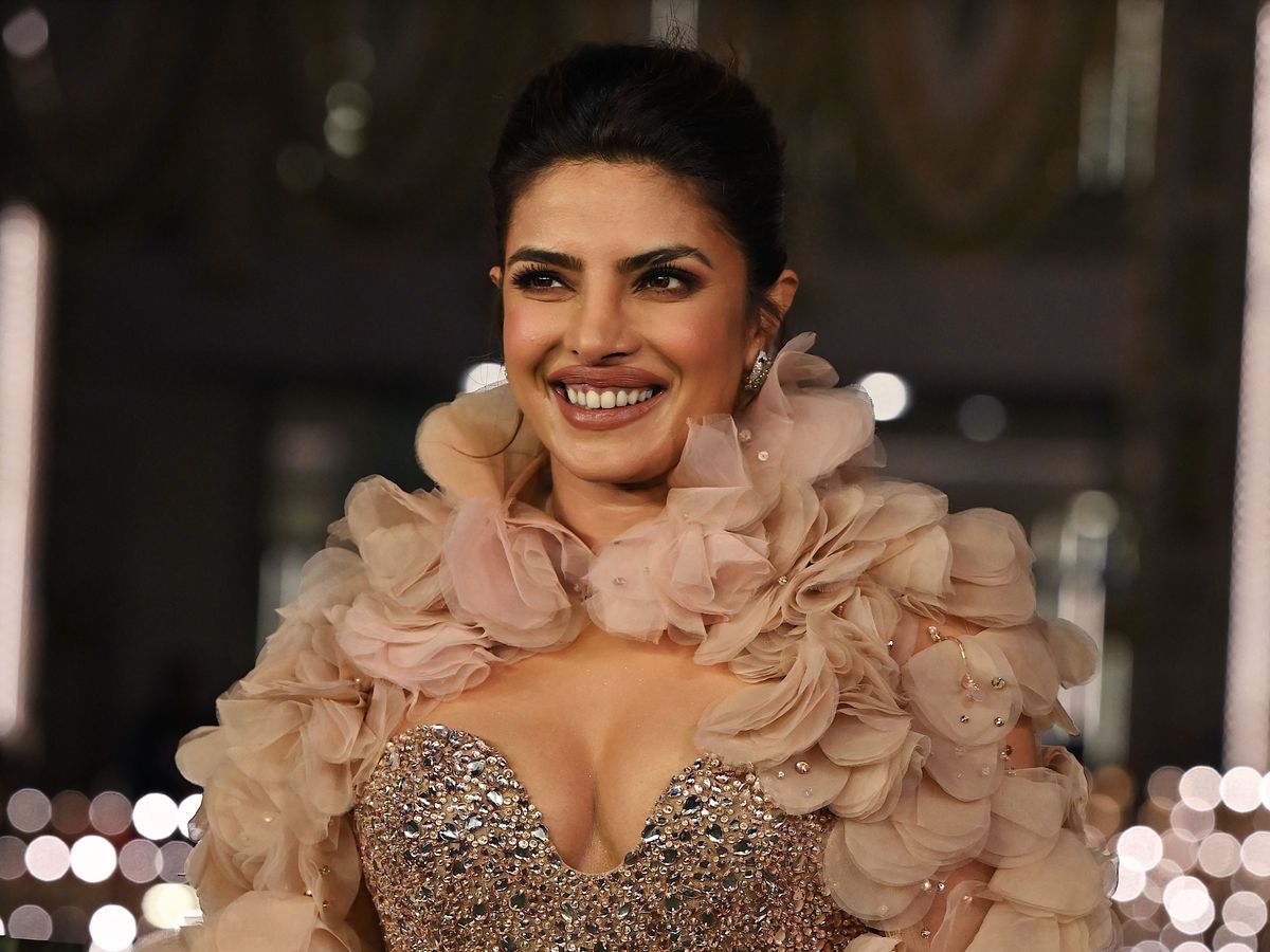 See Priyanka Chopra In a Sheer Jeweled Gown with a Petal-Adorned Cape
