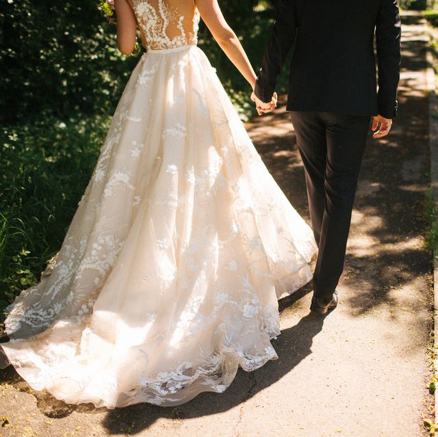 bride and groom walking on pavements