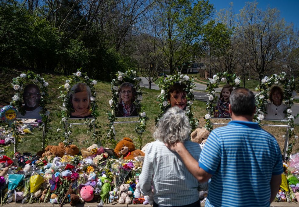 nashville, tn april 01 people visit a makeshift memorial at the entrance of the covenant school on april 1, 2023 in nashville, tennessee three students and three adults were killed by the 28 year old shooter on monday photo by seth heraldgetty images