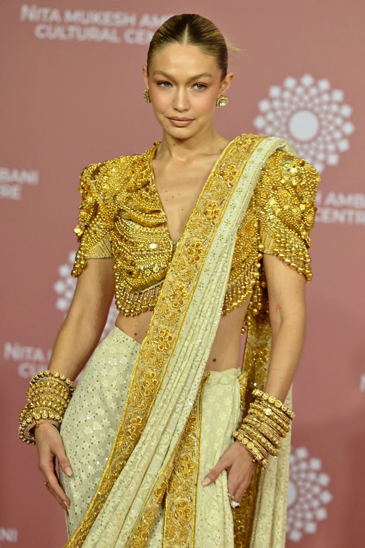 See Gigi Hadid Shine in an Ornate Golden Sari and Matching Jewelry