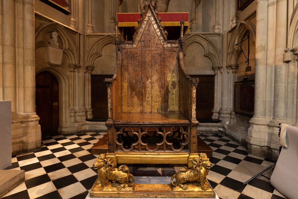 the coronation chair, also known as st edwards chair or king edwards chair, is pictured inside westminster abbey in london on april 12, 2023, during a preview ahead of the coronation of king charles iii preparations for charles may 6 crowning at westminster abbey, set to be attended by dignitaries from around the world and watched by billions, continue to gather pace photo by dan kitwood pool afp photo by dan kitwoodpoolafp via getty images